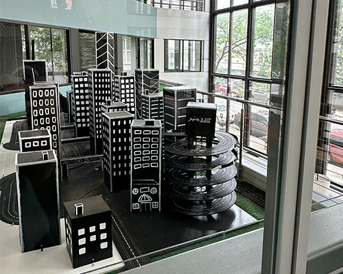 A 4D installation featuring buildings and roads.