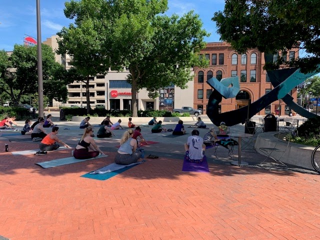 Stretching at Yoga at Cowles Commons