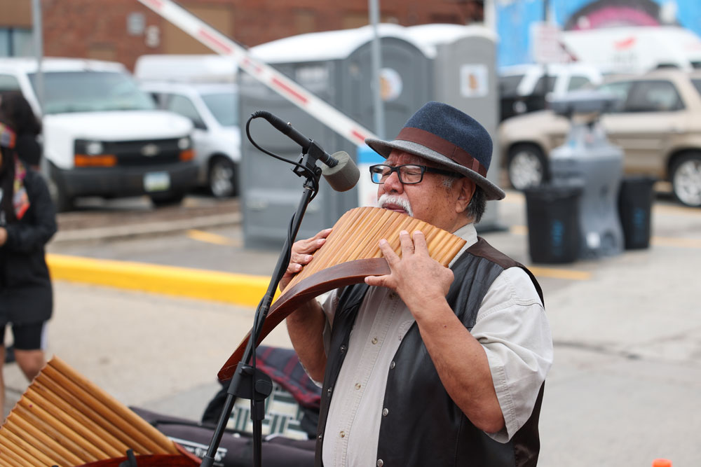 Downtown Farmers' Market man playing music