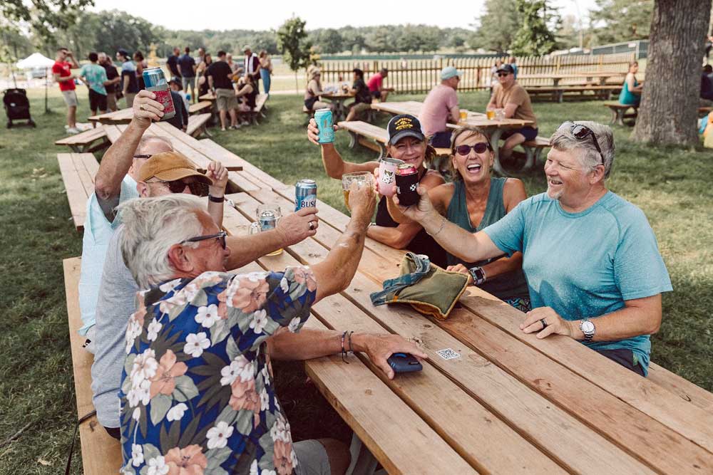 people drinking beer together