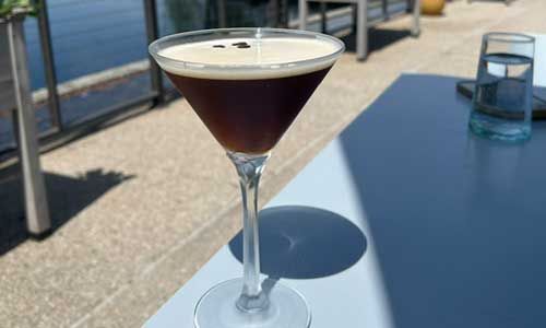 a drink on the patio at Flora