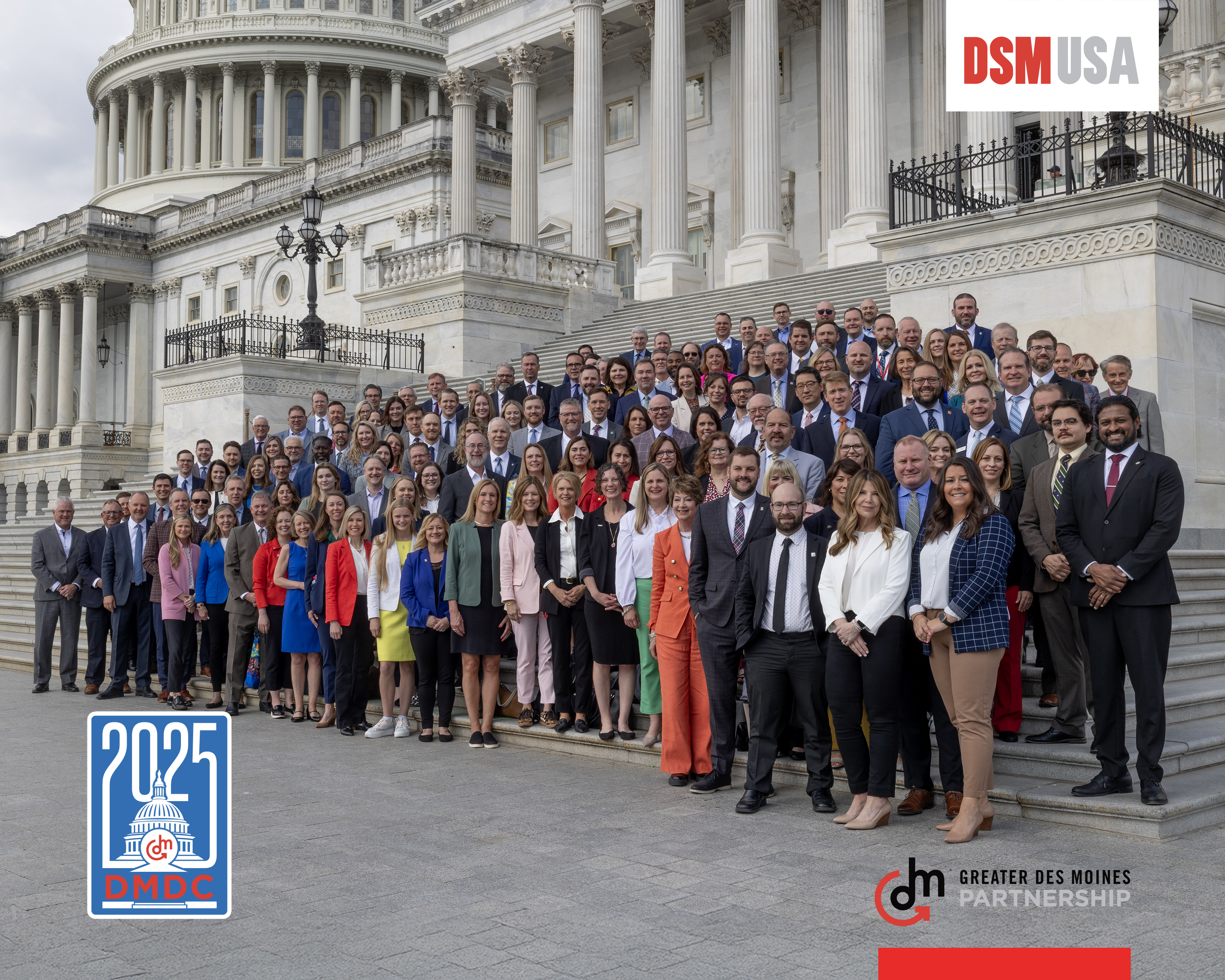 DMDC 2025 A group of over 75 people in front of the capitol building.