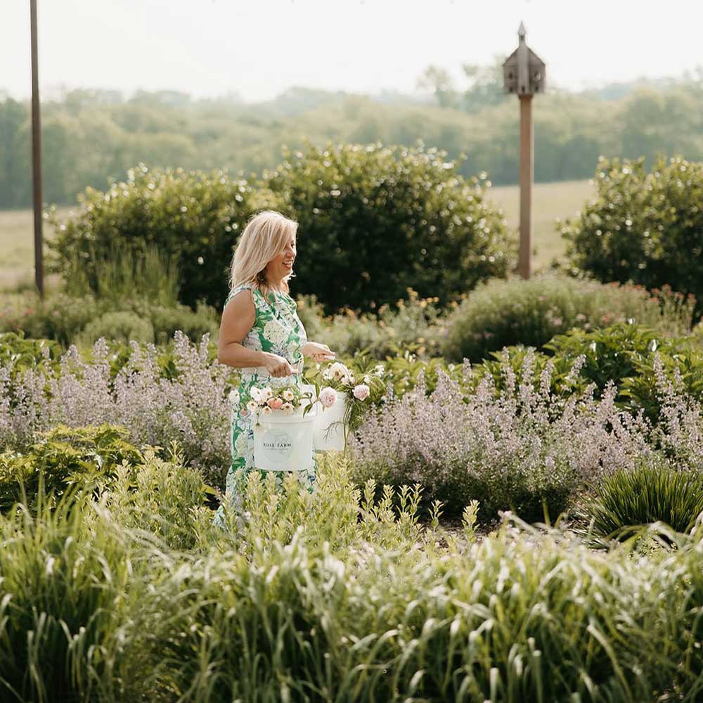 woman walking among the flowers