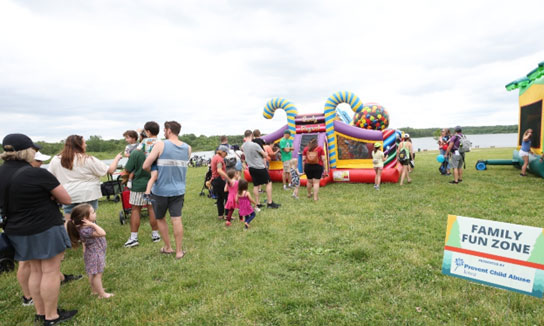 Family Fun Zone families near bounce house