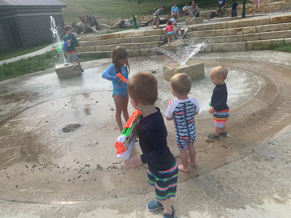 MacRae Park kids playing in splash pad