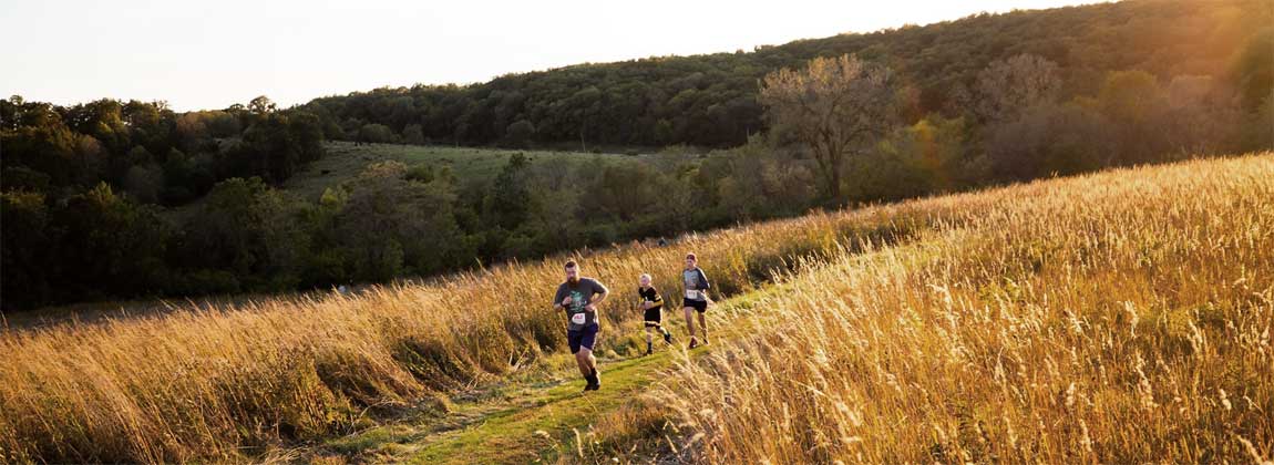 two people running through a field