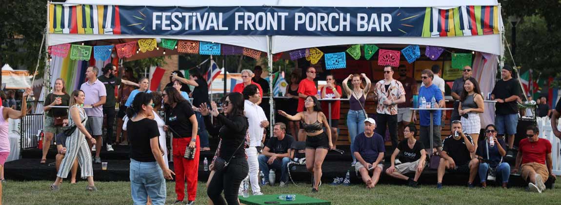 people at the Festival Front Porch Bar tent
