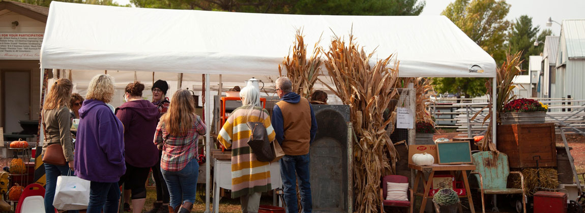 tent with people at Vintage & Made Fair