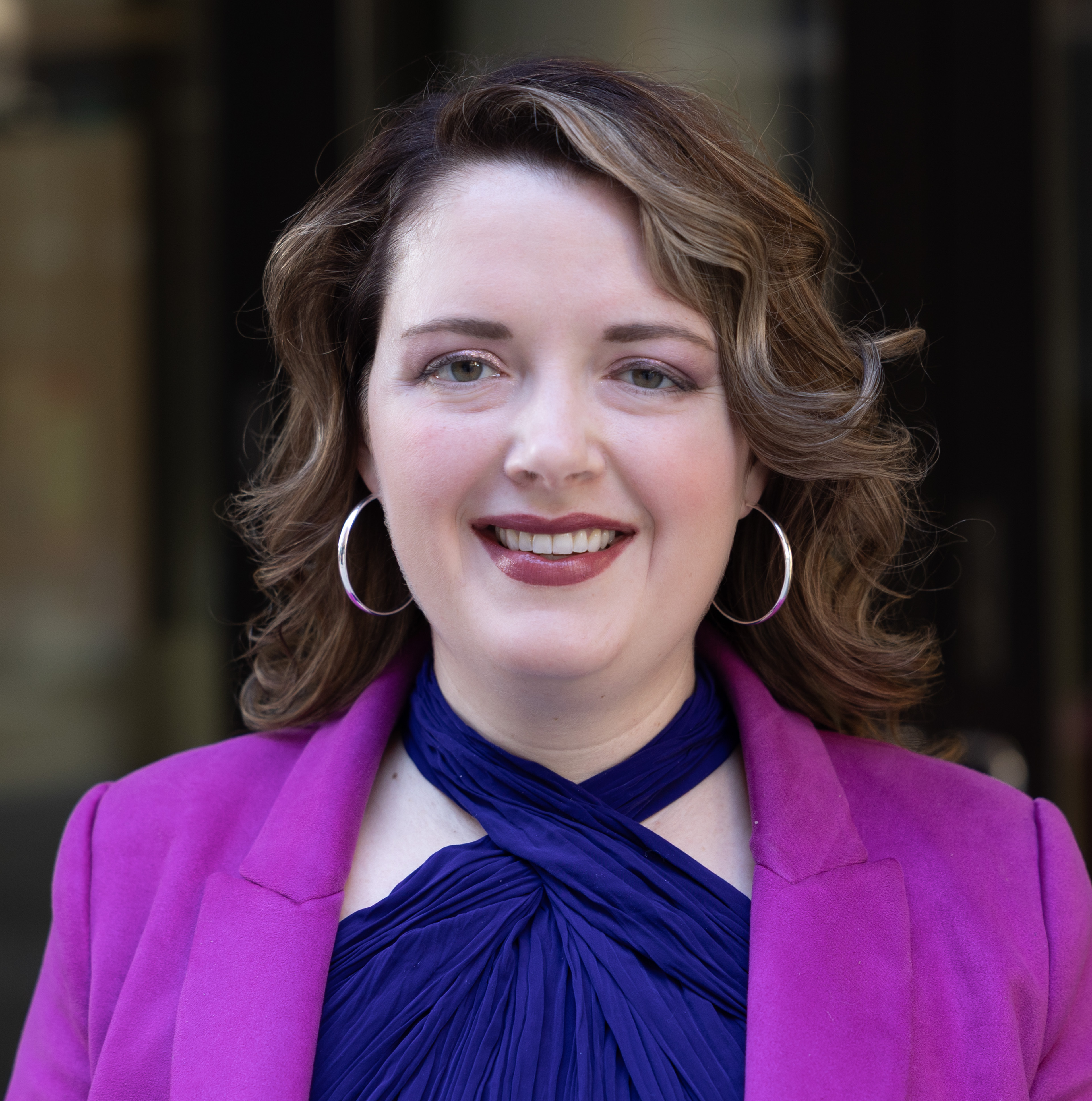 A woman smiling for a photo