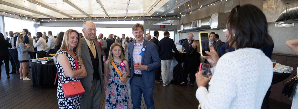 people posing during a DMDC event
