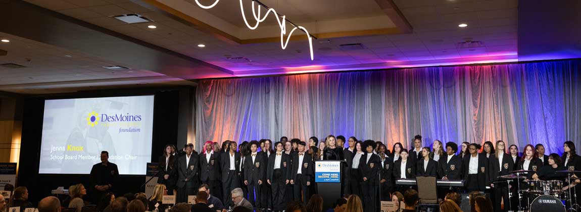 students on stage at the DMPS Foundation Dinner
