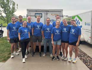 McGill Junge at a Habitat for Humanity event