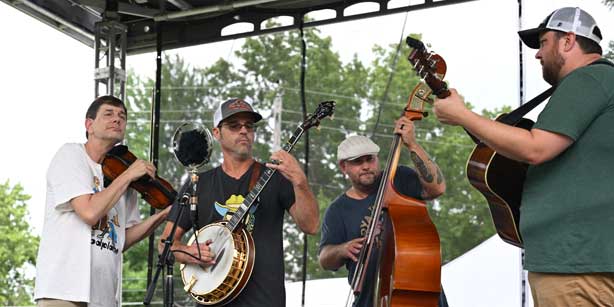 bluegrass band members playing instruments