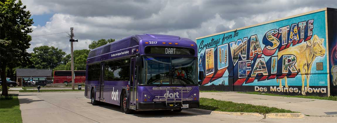 bus in front of Iowa State Fair mural