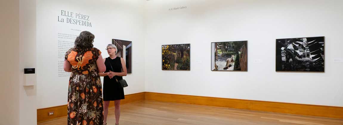 two women in an art gallery