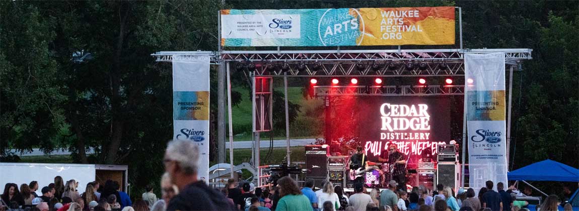 people watching live music at the Waukee Arts Festival