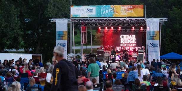 people watching live music at the Waukee Arts Festival