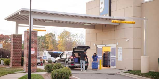 a person dropping off a donation at a Goodwill location