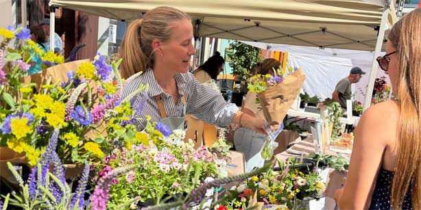 woman buying flowers