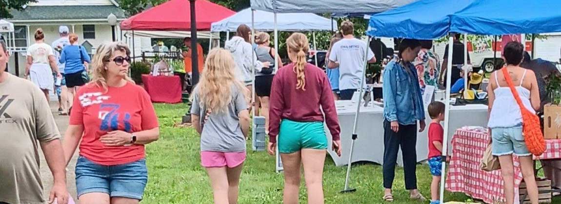 people walking at farmers' market
