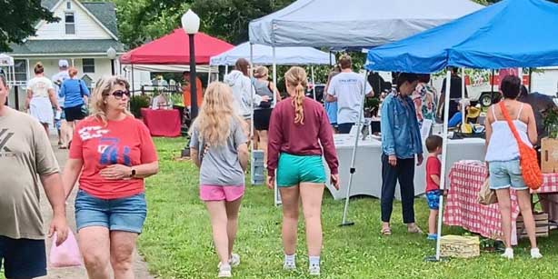 people walking at farmers' market