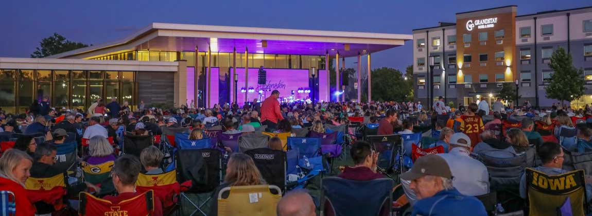 people listening to live music in Johnston