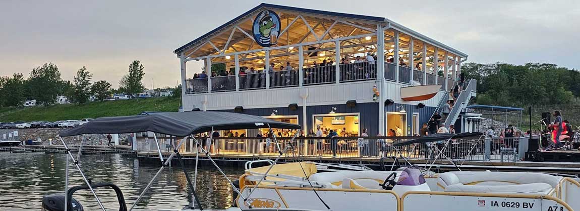 boats and the exterior of The Soggy Frog