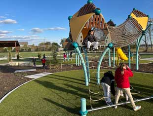children playing on playground equipment