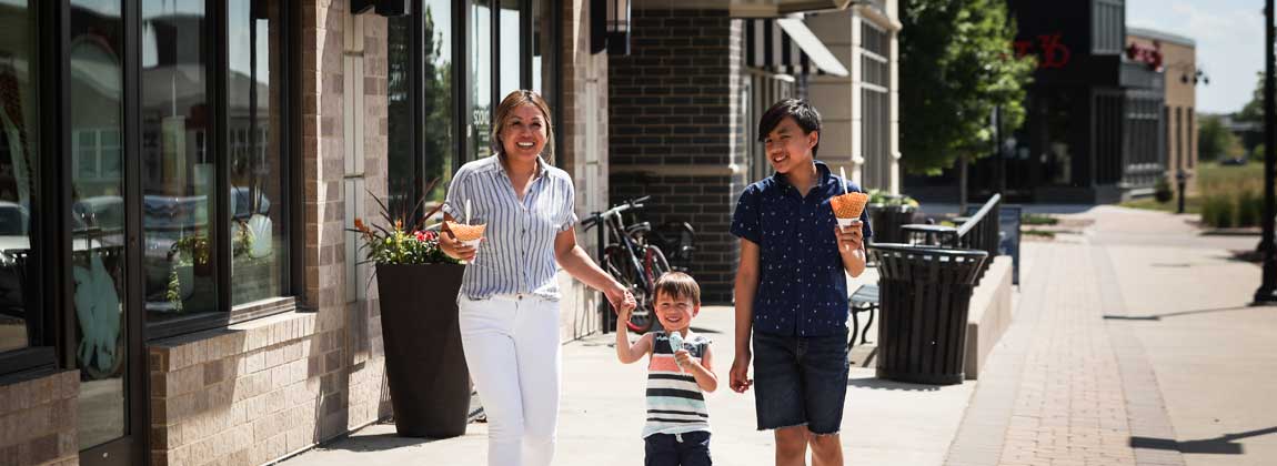 three people eating ice cream