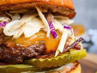 a burger with toppings