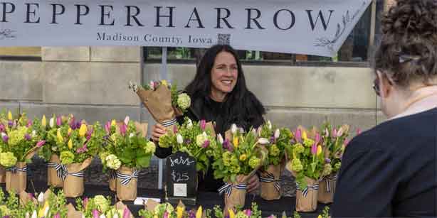 woman smiling with flowers
