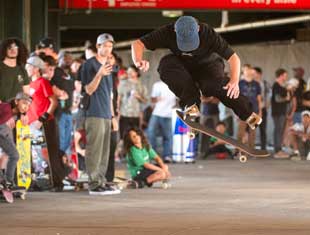 a skateboarder does a trick