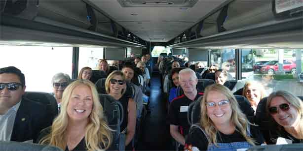 people riding a bus