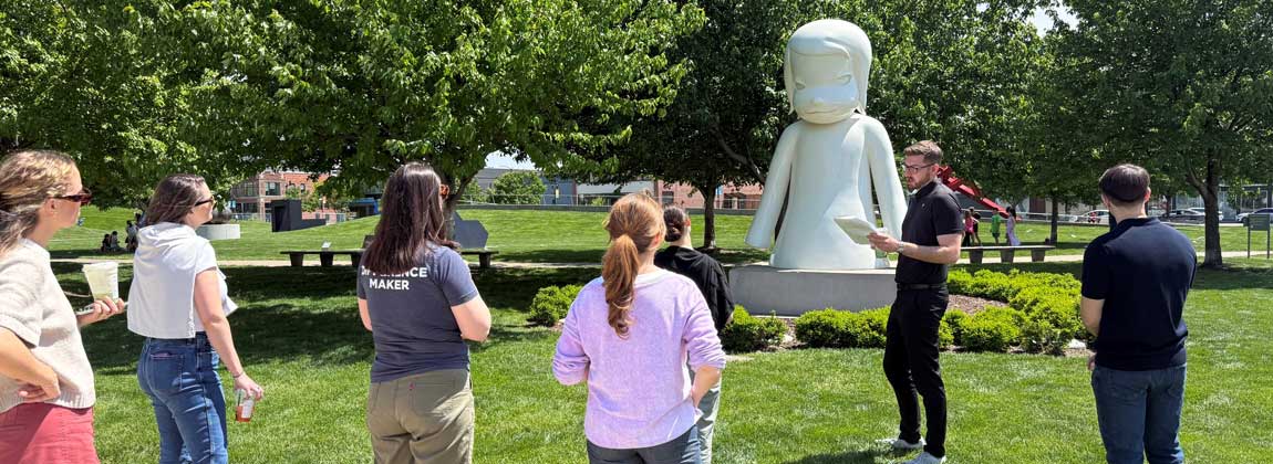 team members at sculpture park