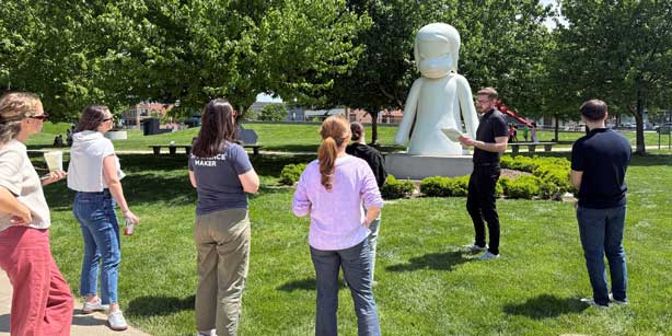 team members at sculpture park